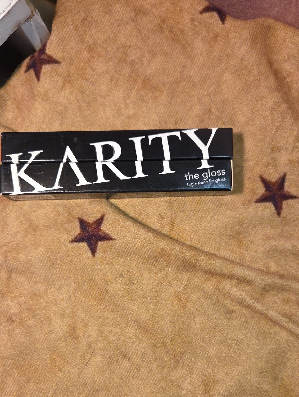 Karity The Gloss High-Shine Lip Gloss - Black Packaging